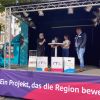 Talkrunde mit Stakeholdern auf der Veranstaltungsbühne